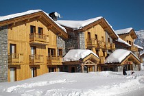 Le Refuge - chalet met sneeuw